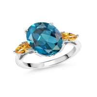 Kralj dragulja 7. Ovalni prsten s londonskim plavim topazom i žutim citrinom od srebra s 3 kamena.